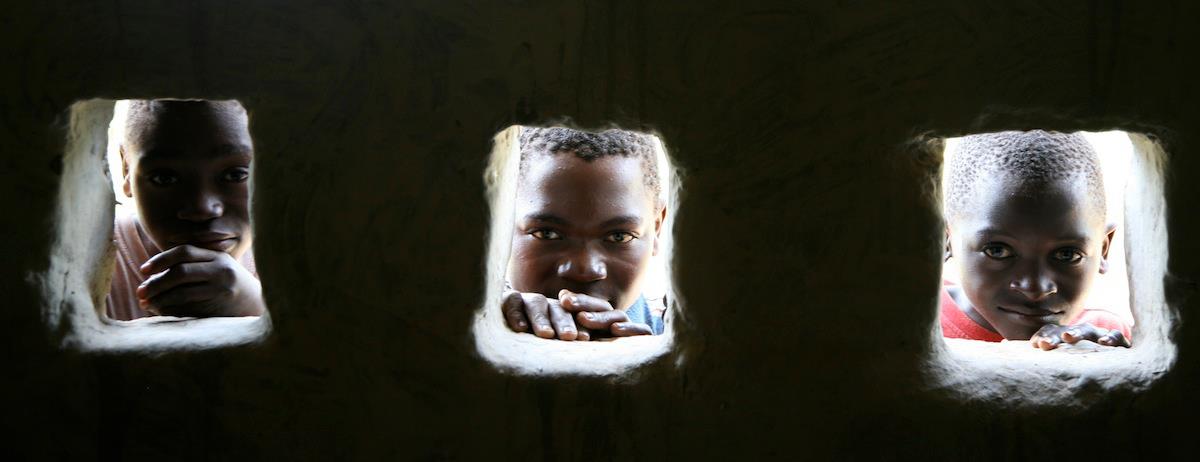 Kids Staring Church Window Zambia, Forgotten Voices